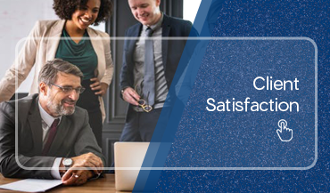 Client satisfaction: image of attorneys sitting around a computer Client satisfaction: image of attorneys sitting around a computer